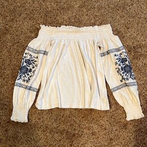American Eagle off the shoulder top with blue embroidery